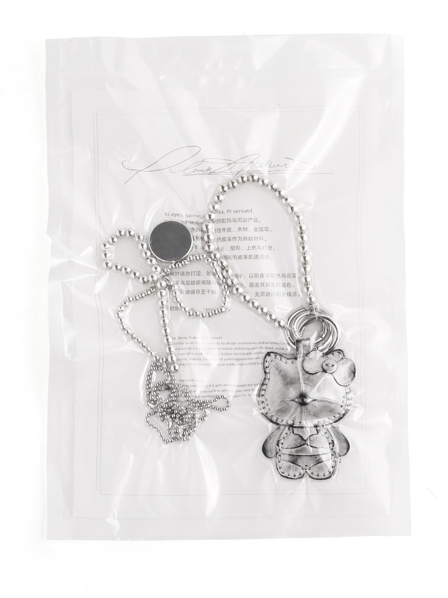 Plank Ateliers 'WHO AM I?' Leather Pendant